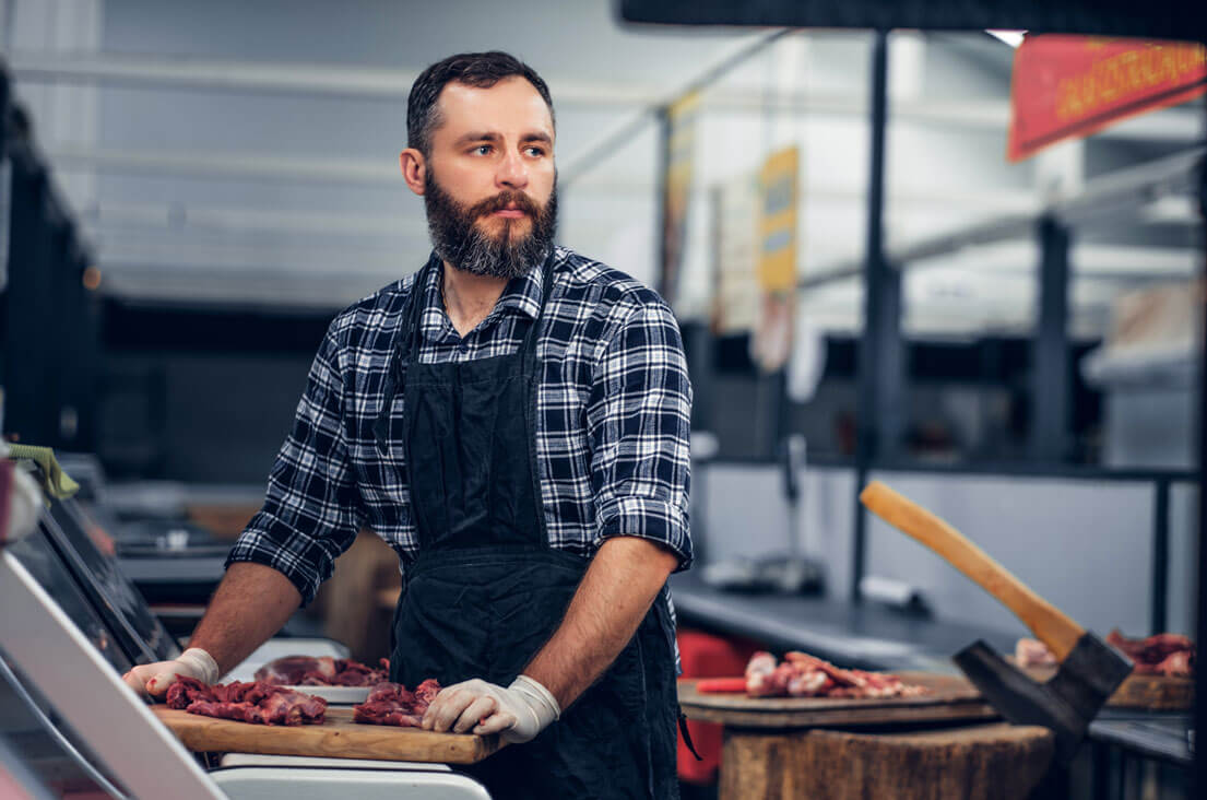 Butcher Preparing Meat