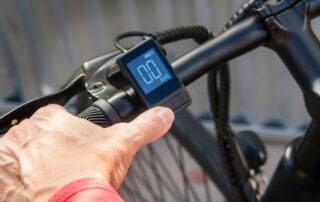 Man Holding Electric Bike Handlebar