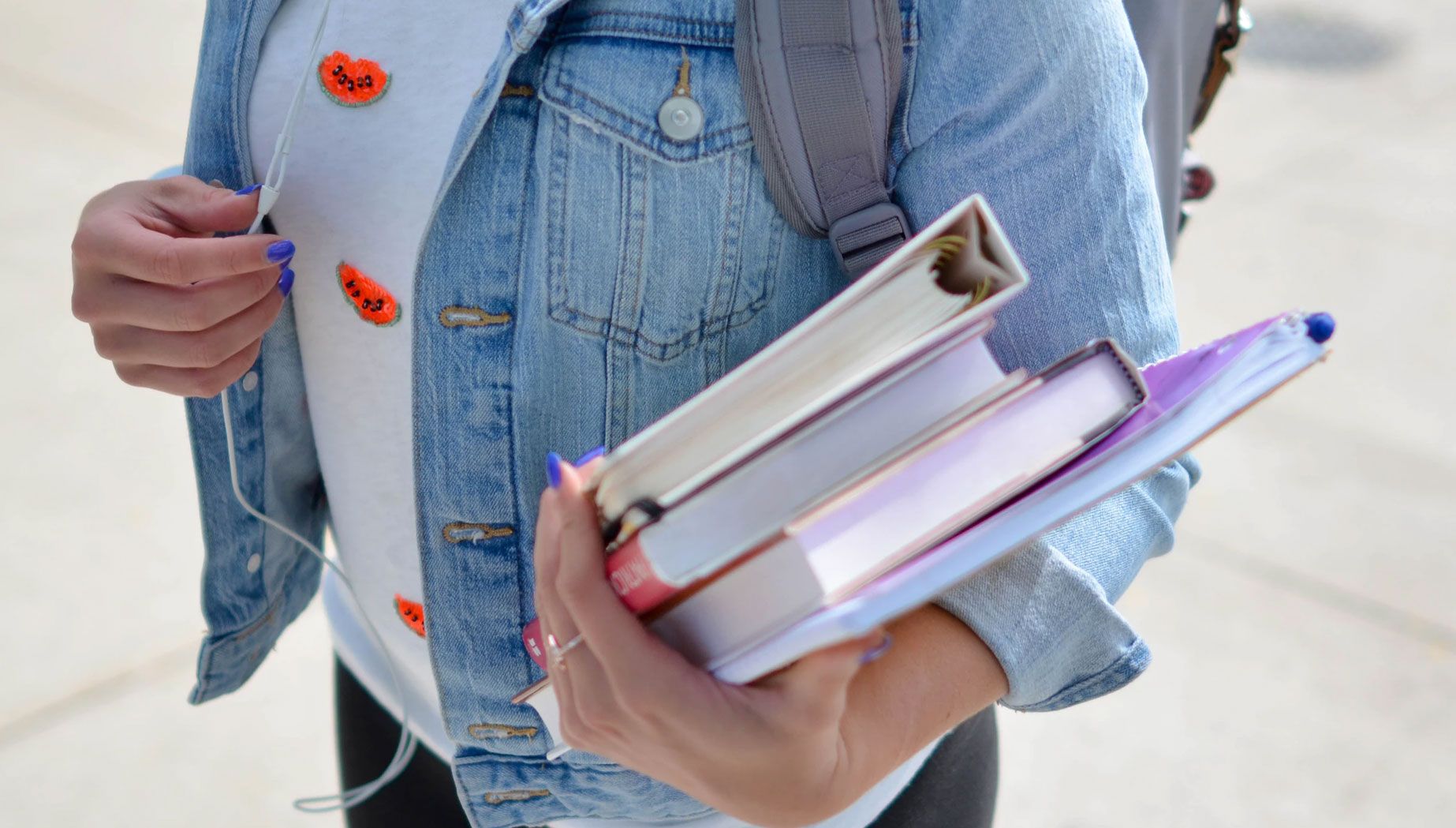 Person Carrying Books