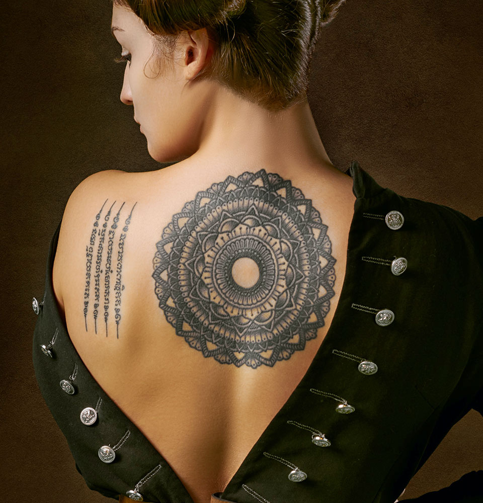 Woman with Geometric Tattoo on Back