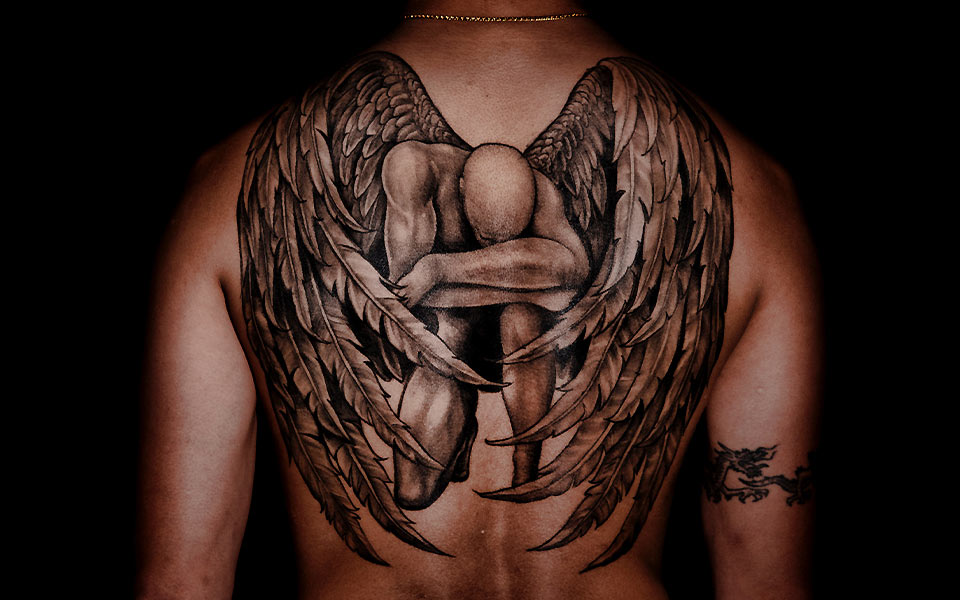 Man with Tattoo on Back