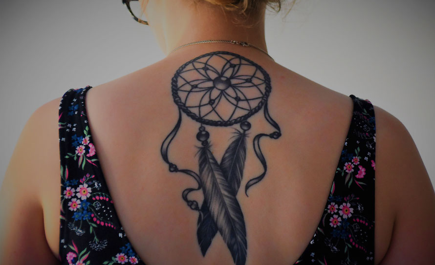 Woman with Tattoo on her Back